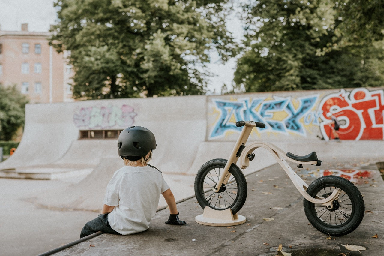Wooden balance bike for young children in outdoor setting — Balance Bike 3in1 — AlmaVidaKids