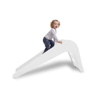 Child using white indoor slide for toddlers — Jupiduu Indoor Slide — AlmaVidaKids