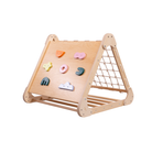 Wooden climbing frame with colorful shapes on a white background