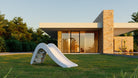 White outdoor slide in garden play setup - Jupiduu Outdoor Slide - AlmaVidaKids