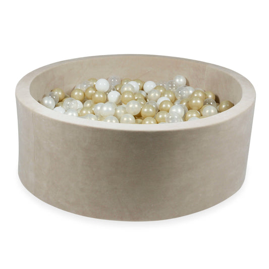 Ballpit with beige, white, transparent and golden balls