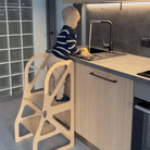 Securestep 2-in-1 learning tower used during an everyday kitchen activity