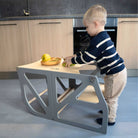 Securestep 2-in-1 learning tower transformed into toddler table and bench mode